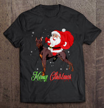 Load image into Gallery viewer, Merry Christmas Santa Claus Riding Doberman Pinscher T-Shirt, Ladies T-Shirt, LongSleeve, Hoodie 2D
